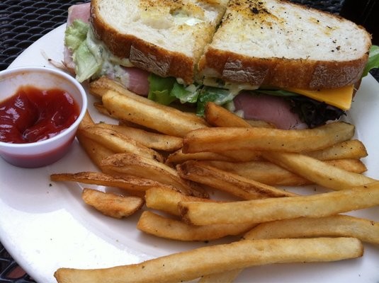 <p>The club sandwhich and fries at the Blind Tiger.</p>