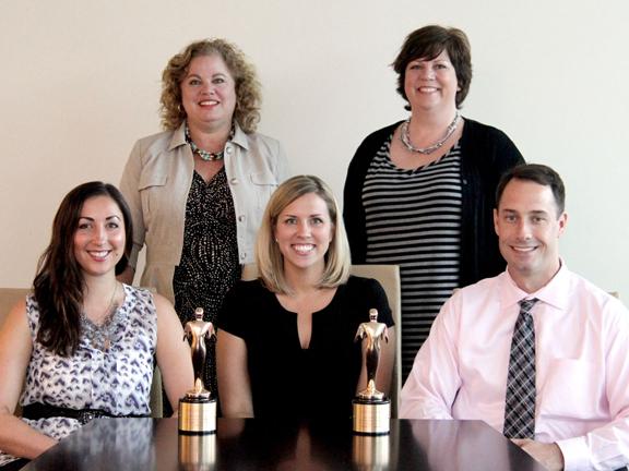 <p>Select Health won two bronze Telly Awards in the regional TV categories of insurance and use of animation for its 30-second “First Choice has my doctor!” commercial. Front row (L-R): Jill Lemay, culturally and linguistically appropriate services coordinator; Laura Blanchard, senior writer; Mike Saia, media relations specialist. Back row (L-R): Patricia Crimminger, director of communications; Reid Strauss, senior graphic designer.</p>
